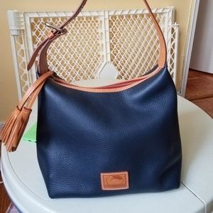Dooney & Bourke hand bag. Approx 11hx11w